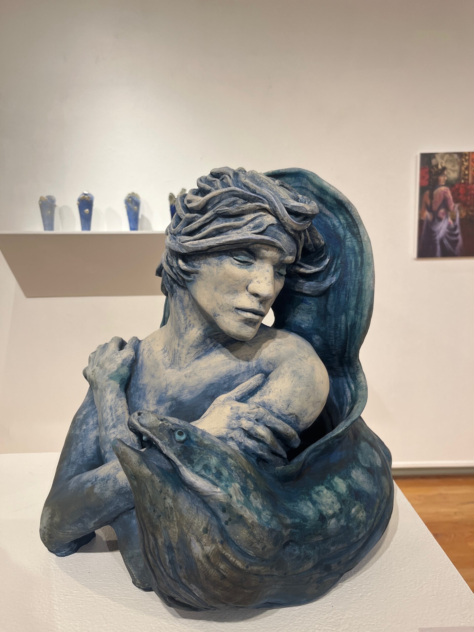 student ceramic figure. This image adds visual interest to the page.